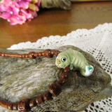 Vintage Choker Necklace with Pottery Manatee and Carved Wood Beads Peruvian c. 1970s - Attic and Barn Treasures