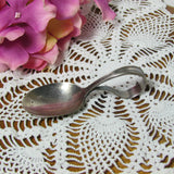Vintage Oneida Loop Handle Toddler Spoon in Tudor Plate - Attic and Barn Treasures