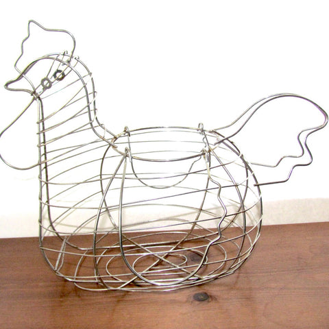 https://atticandbarntreasures.com/cdn/shop/products/wire_chicken_shape_egg_basket_4_large.JPG?v=1594401412